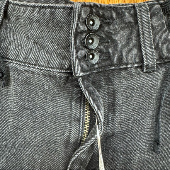 Social Collision Black Wash Pleated Ruffle Mini Skirt with Lace-Up Front Detail - Picture 3 of 9